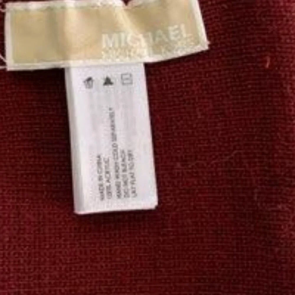 Michael Kors signature headband in a burgundy and black MK logo print